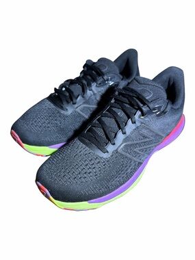 New Balance Women's Black Running Shoes with Neon Green and Purple Midsole
